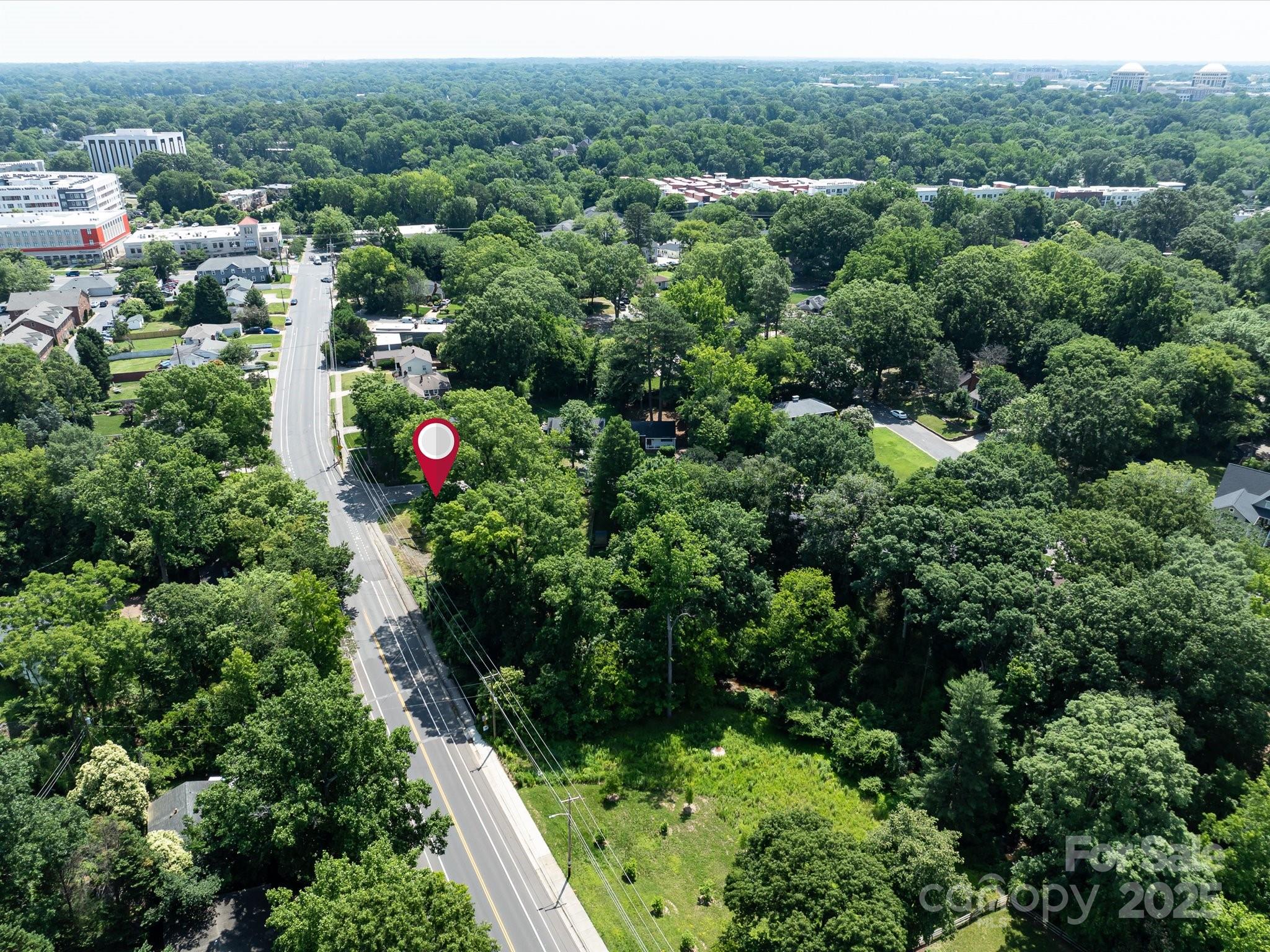 4800 Valley Stream Road Charlotte, NC 28209 - Photo 12 of 16 an aerial view of residential house with outdoor space and street view