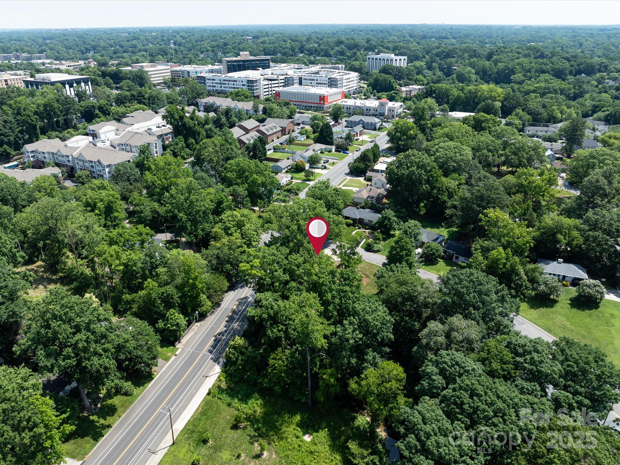 4800 Valley Stream Road Charlotte, NC 28209 - Photo 13 of 16 an aerial view of residential house with outdoor space and street view