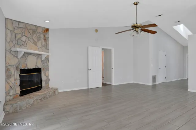 a view of a room with racks on the wall