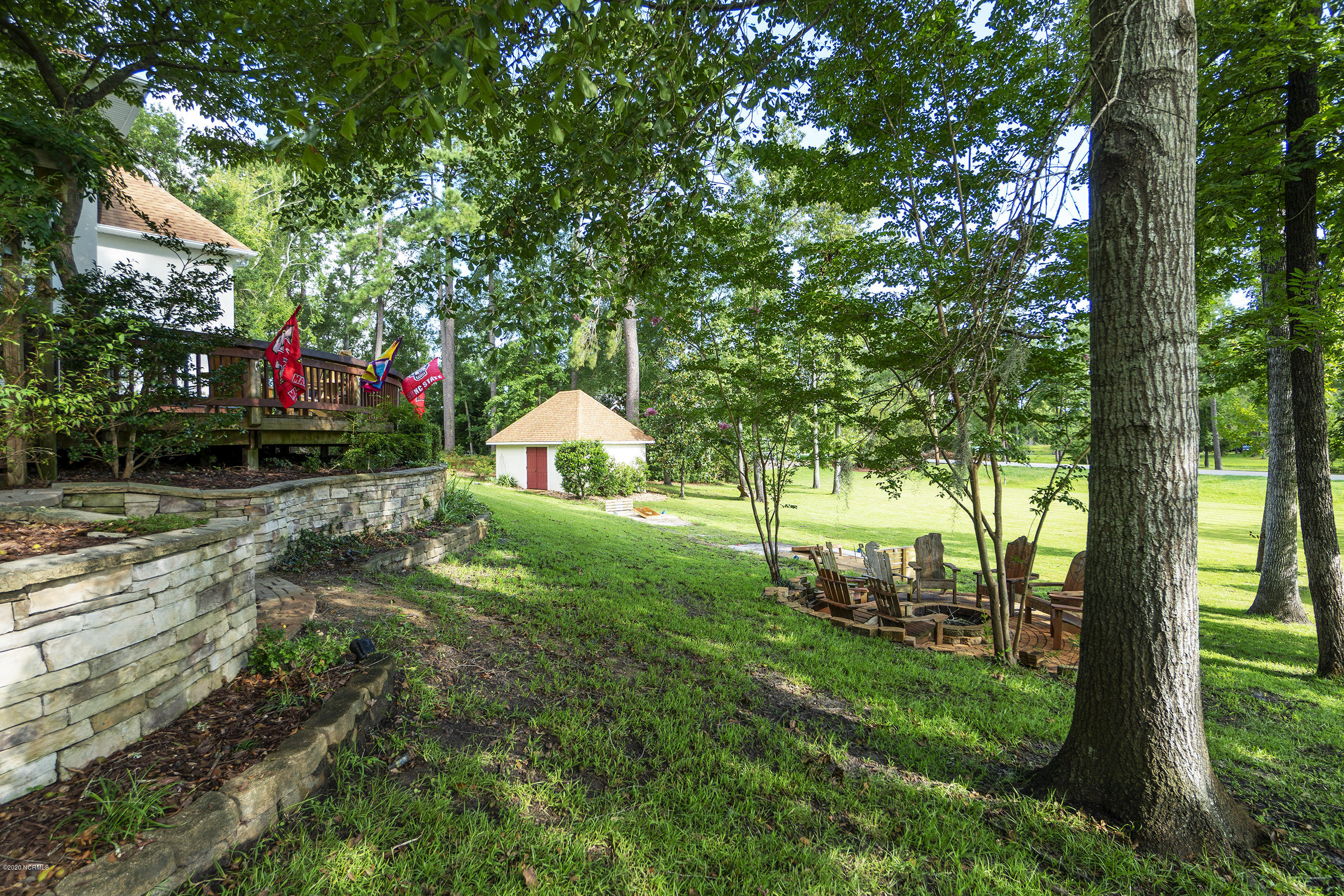 202 Castle Ridge Road New Bern, NC 28562 - Photo 52 of 72 Side Yard with Firepit Area