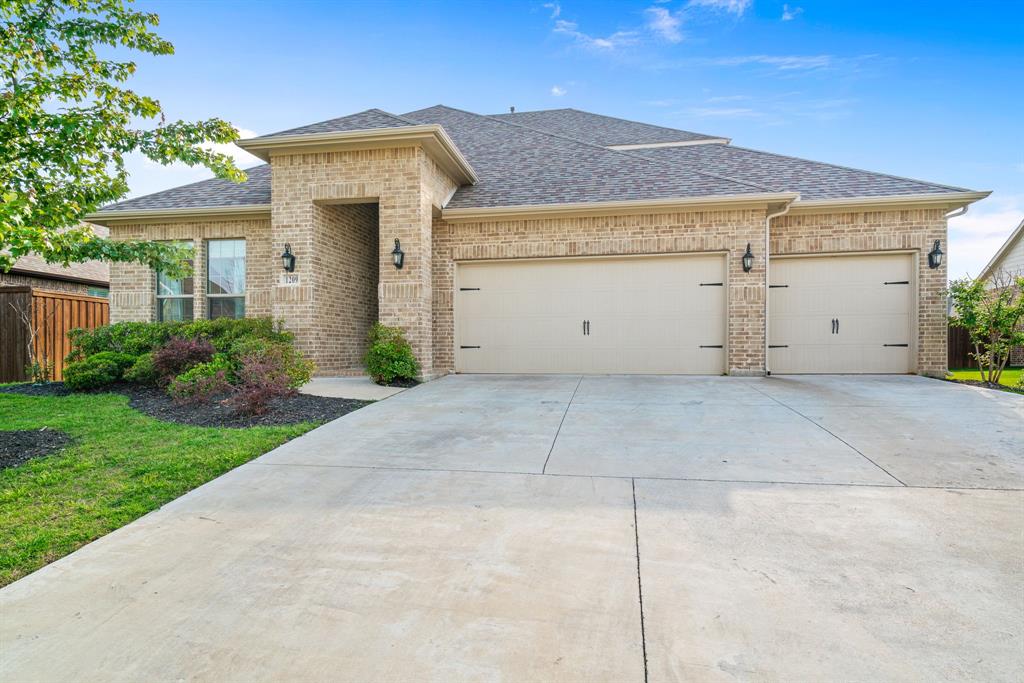 1209 Glendon Drive Forney, TX 75126 - Photo 1 of 1 a view of a house with backyard