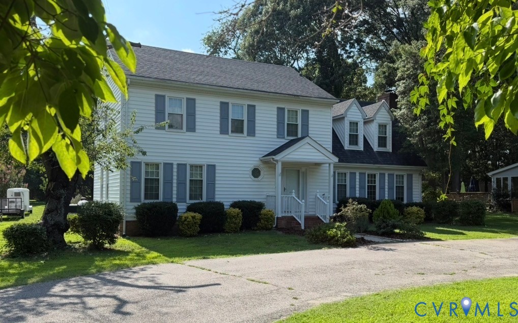 1760 Gloucester Road Gloucester Point, VA 23062 - Photo 2 of 2 Two-story residence featuring white siding and a d