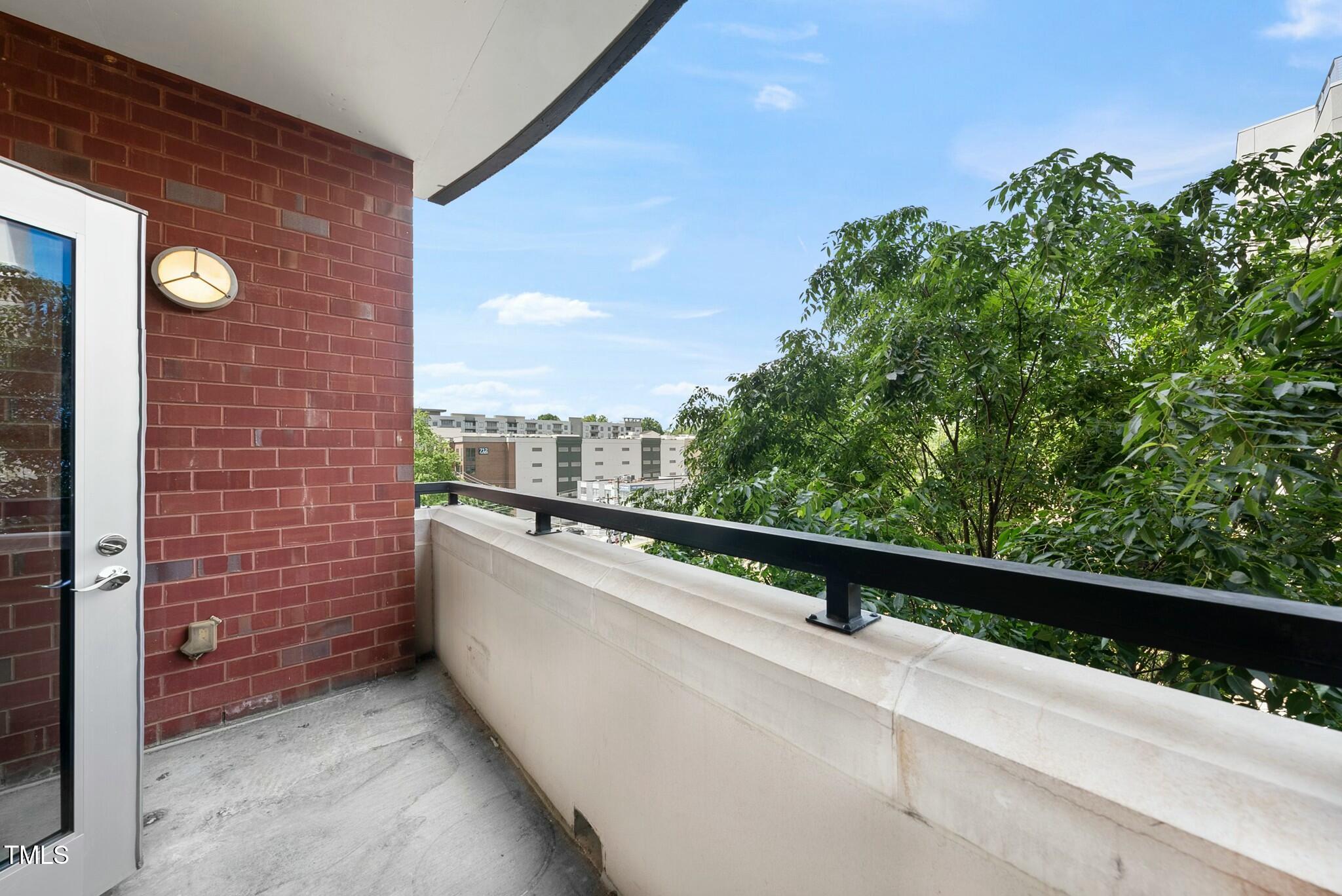 618 North Boylan Avenue, Unit 400 Raleigh, NC 27603 - Photo 16 of 28 a view of a building from a balcony