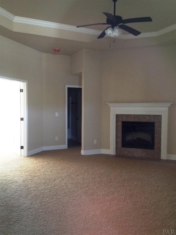 9967 Nichols Lake Road Milton, FL 32583 - Photo 9 of 26 Great room with beautiful fireplace.
