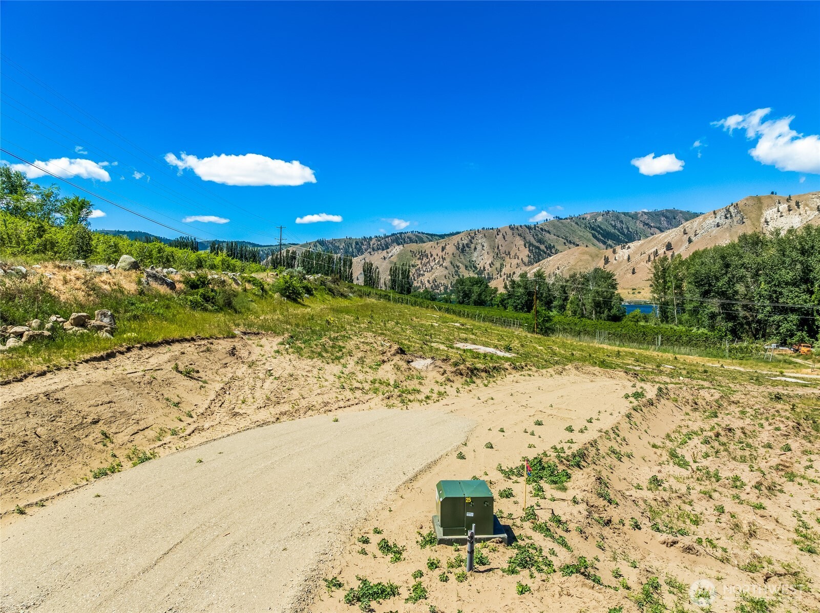 0 Lot 4 Silvest Road Orondo, WA 98843 - Photo 15 of 23 a view of a beach with a yard