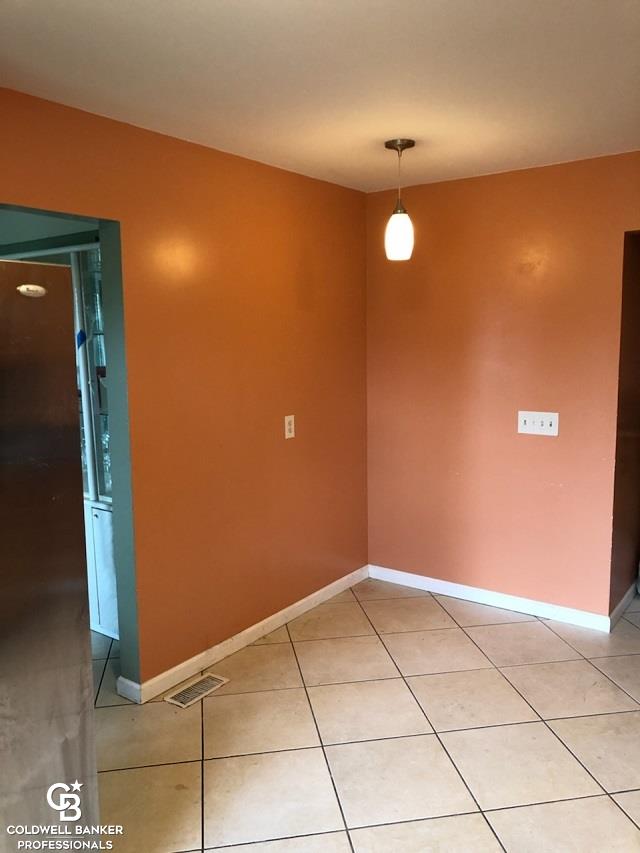 8438 North Brockway Road Yale, MI 48097 - Photo 6 of 27 This is a view of the kitchen into the dining.