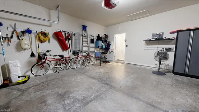 a view of a backyard with sitting area and tub