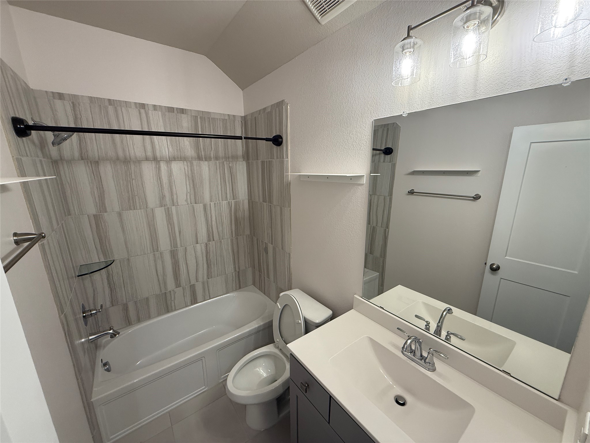 10534 Wild Chives Conroe, TX 77385 - Photo 20 of 24 a bathroom with a sink toilet and shower