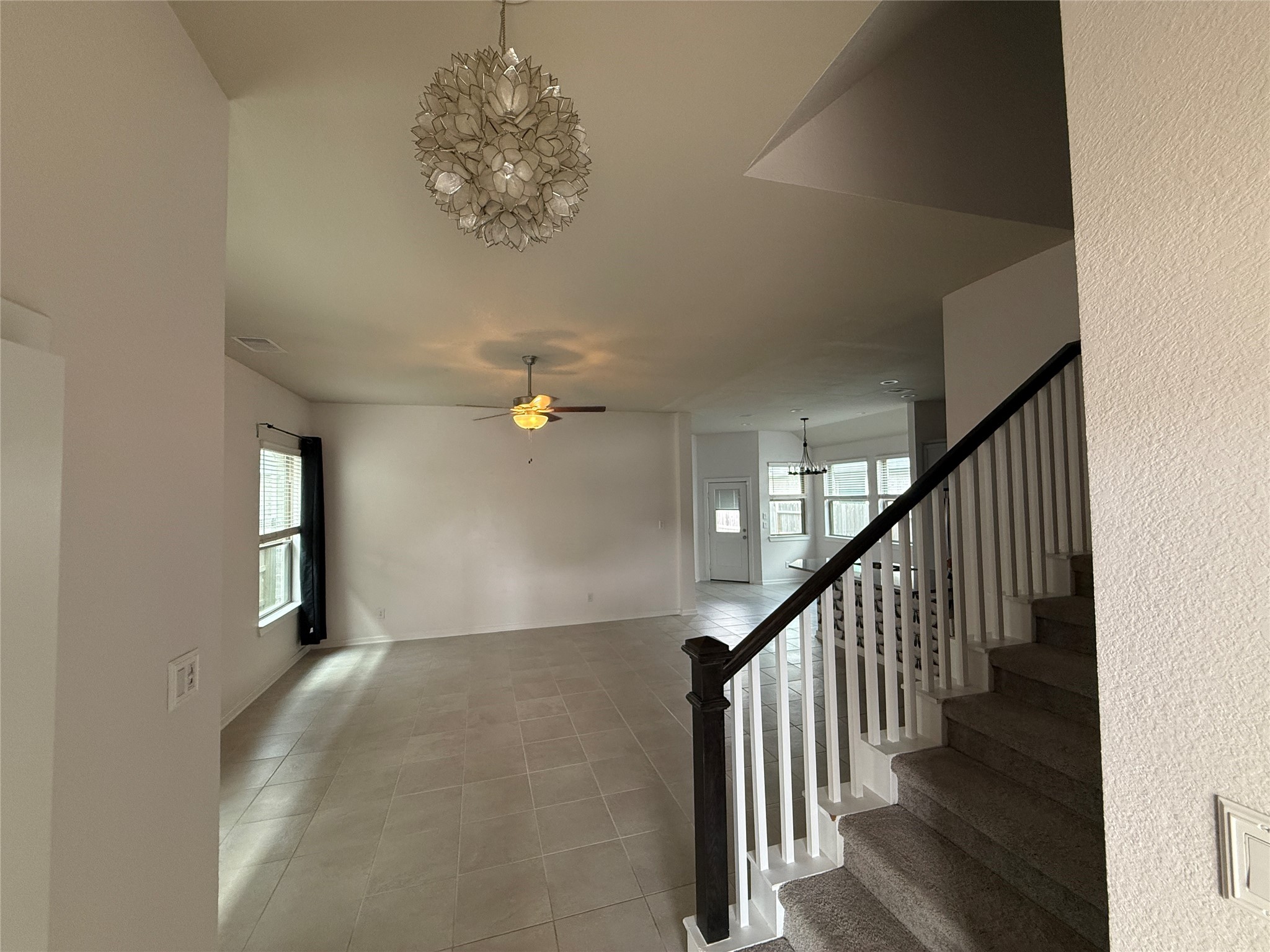 10534 Wild Chives Conroe, TX 77385 - Photo 4 of 24 a view of a hallway with stairs