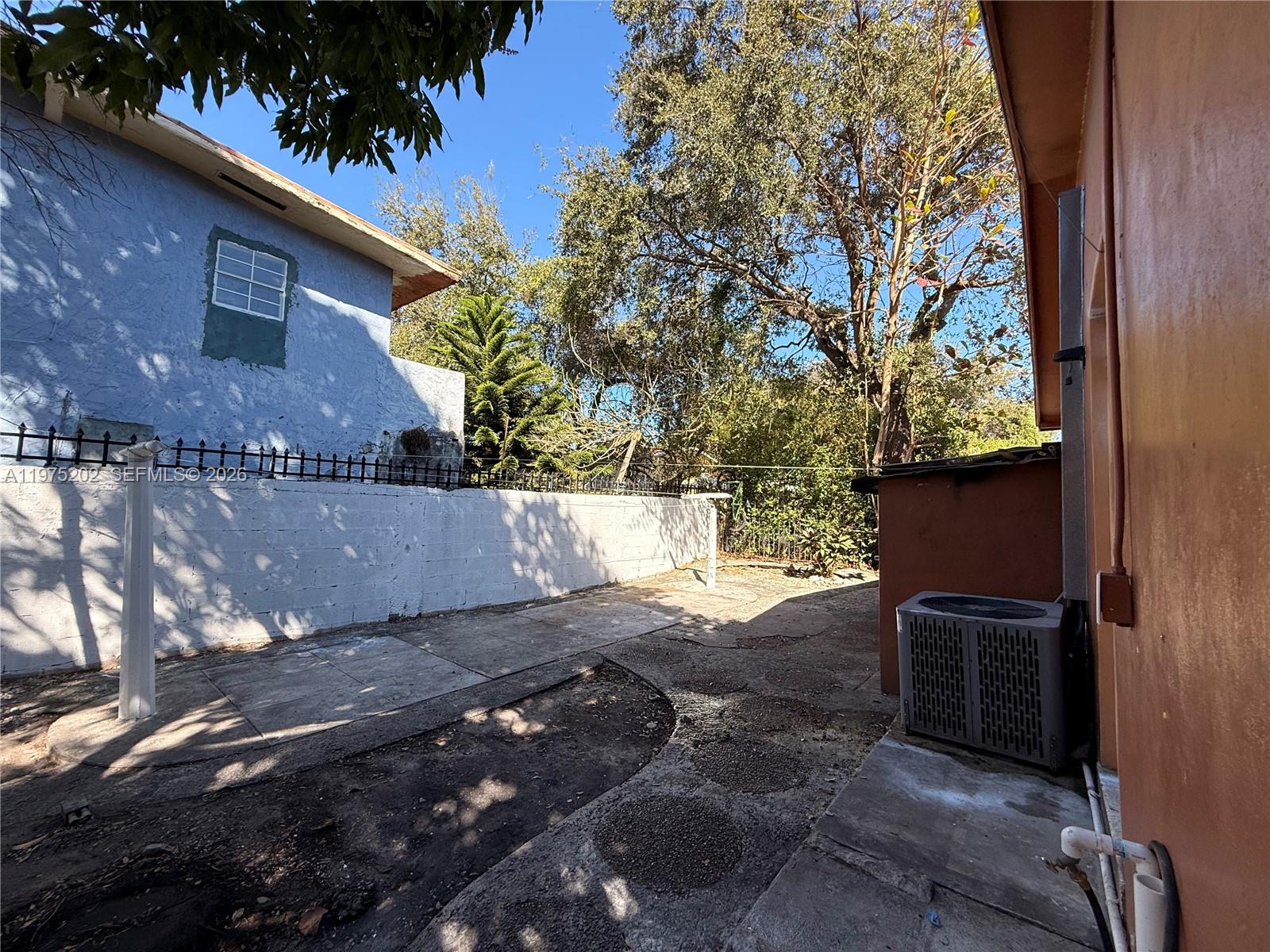 313 Northeast 57th Street, Unit 313 Miami, FL 33137 - Photo 12 of 13 a view of backyard with outdoor space