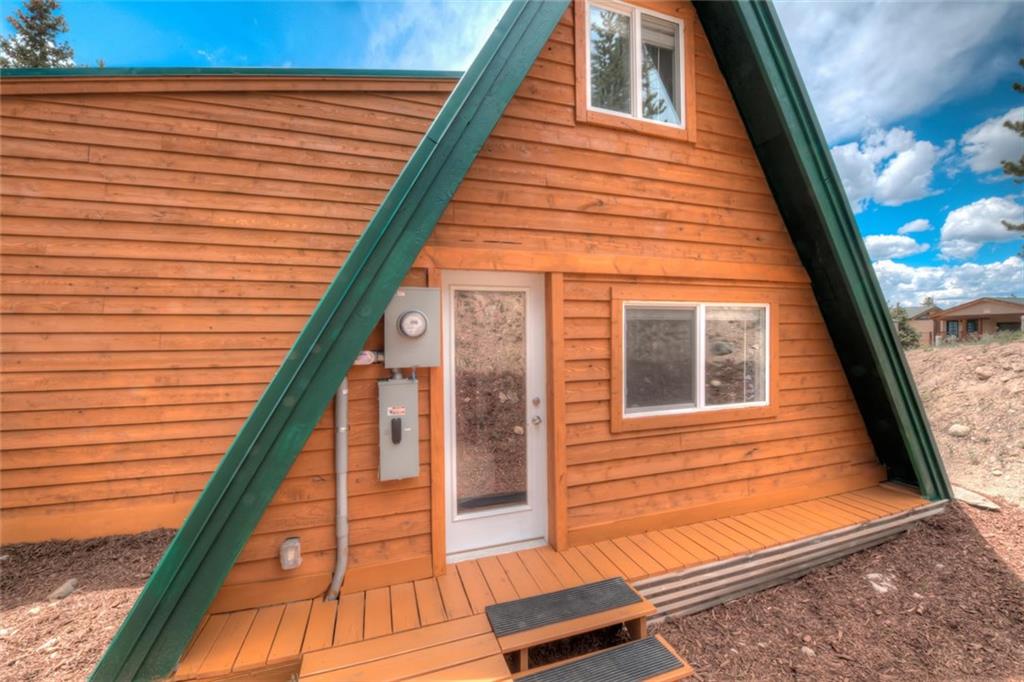 217 G Road Silverthorne, CO 80498 - Photo 19 of 24 a view of a balcony with wooden floor and stairs