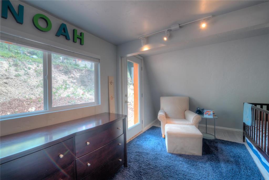 217 G Road Silverthorne, CO 80498 - Photo 6 of 24 a living room with furniture and a window