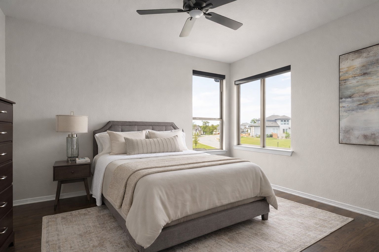 546 Bridge Water Loop Dripping Springs, TX 78620 - Photo 27 of 40 a bedroom with a bed and window