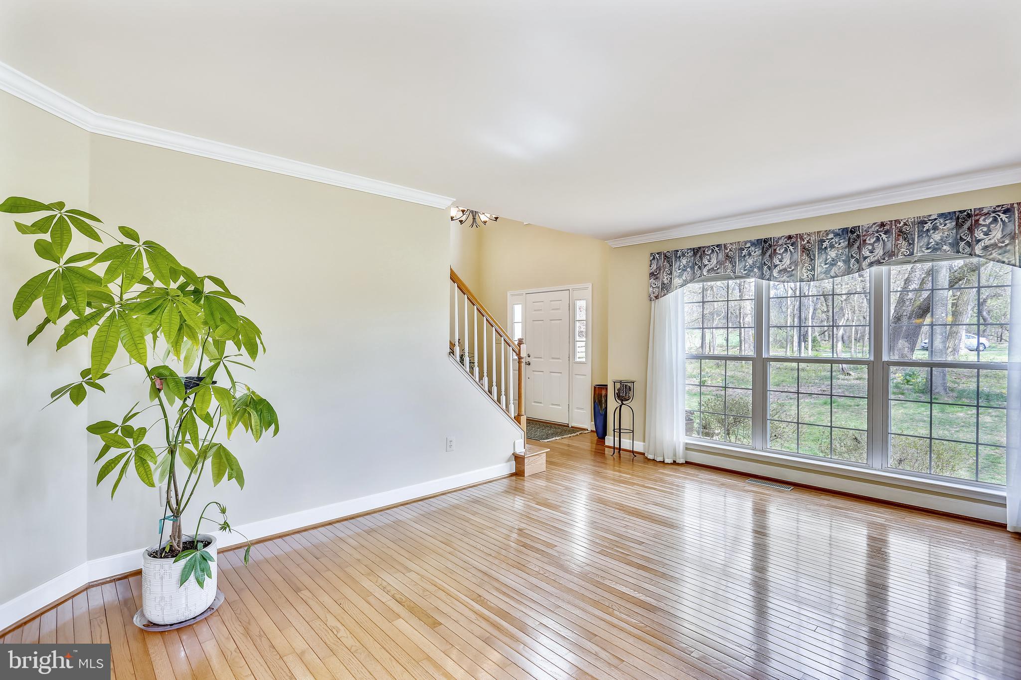 20931 Sunnyacres Road Gaithersburg, MD 20882 - Photo 13 of 83 Large windows to the front bring in light
