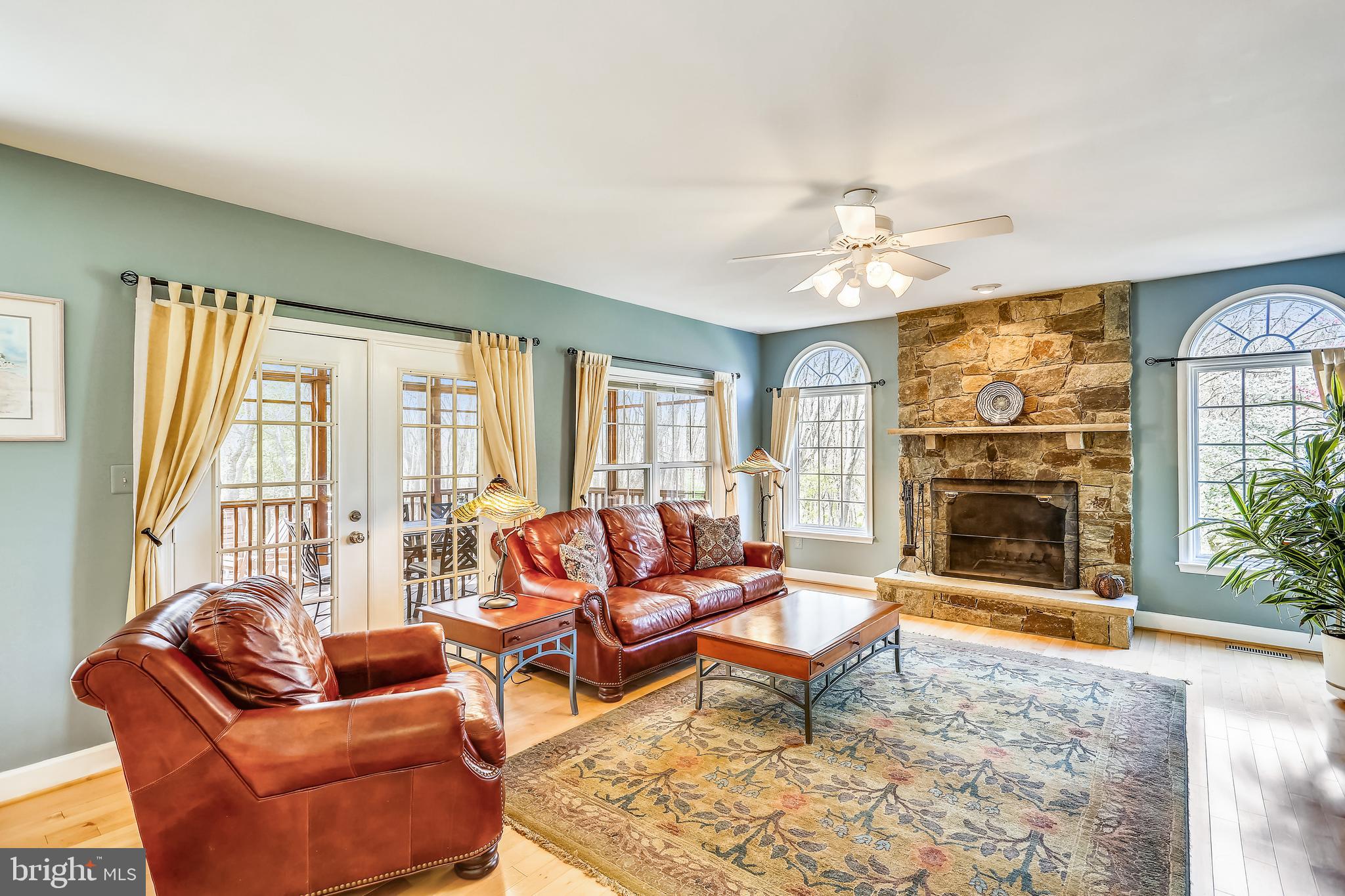 20931 Sunnyacres Road Gaithersburg, MD 20882 - Photo 25 of 83 Family room has stone wood-burning fireplace