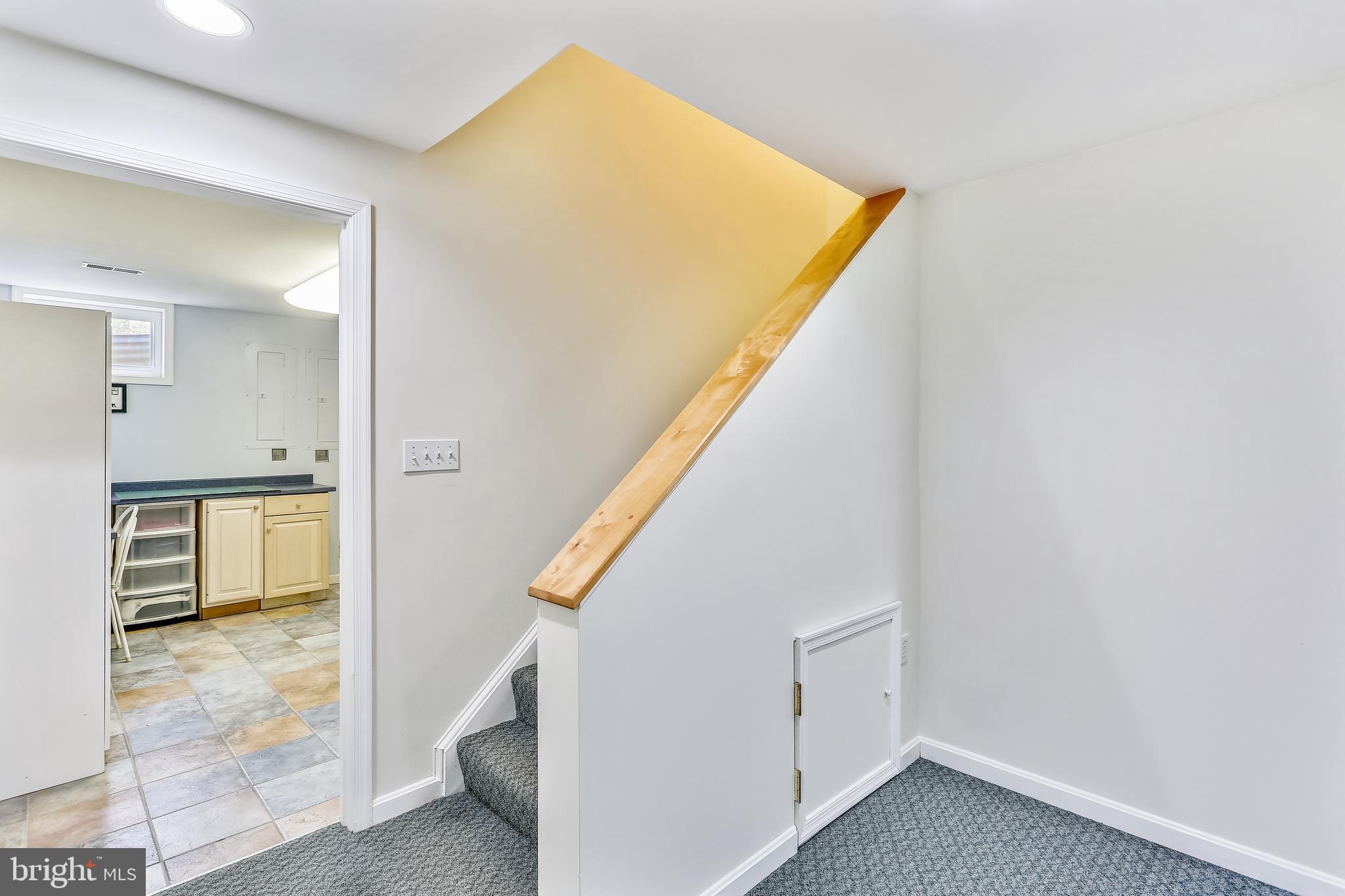 20931 Sunnyacres Road Gaithersburg, MD 20882 - Photo 49 of 83 Stairs lead to upper main level