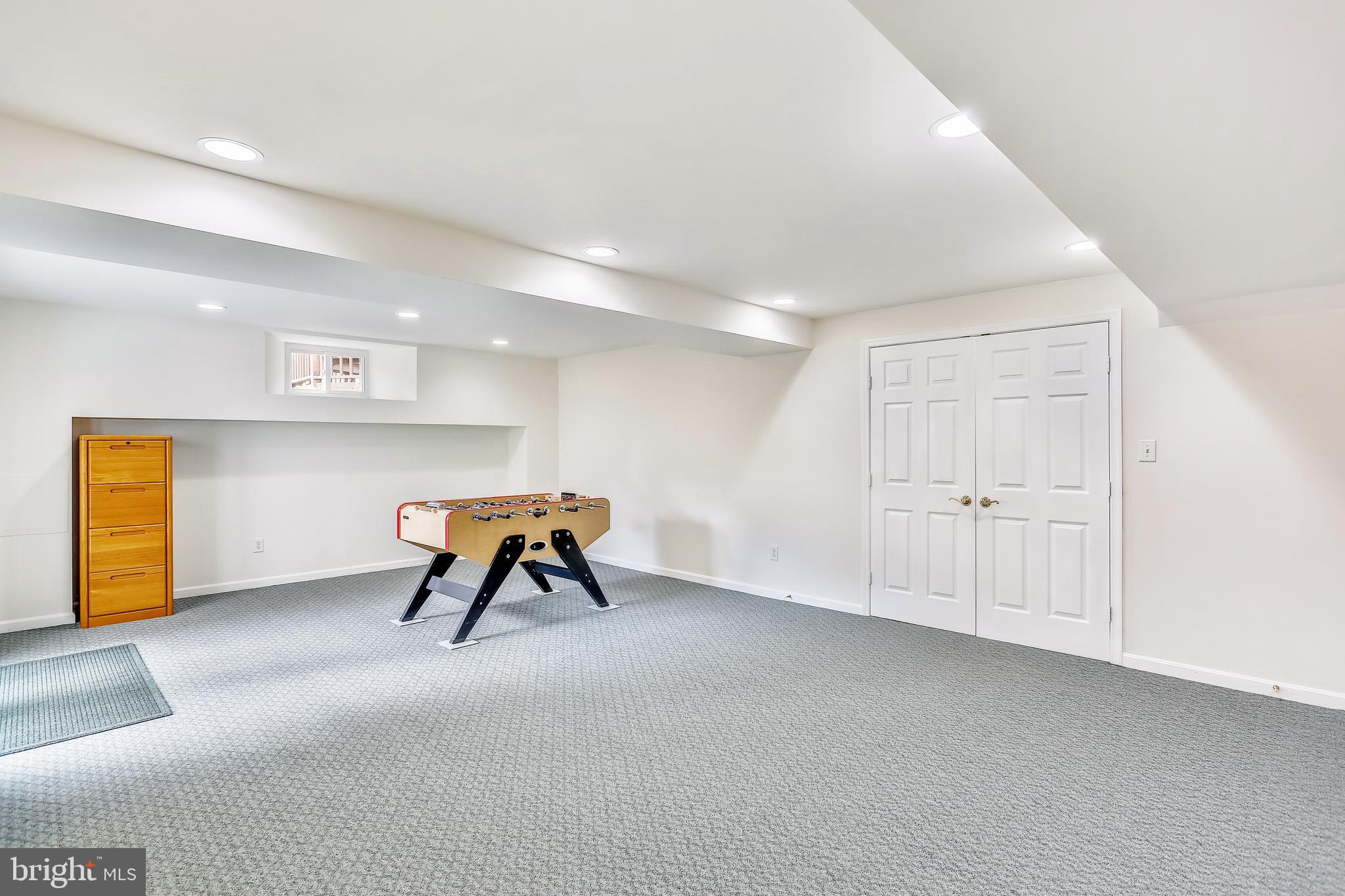 20931 Sunnyacres Road Gaithersburg, MD 20882 - Photo 51 of 83 L-shaped recreation room has storage closets