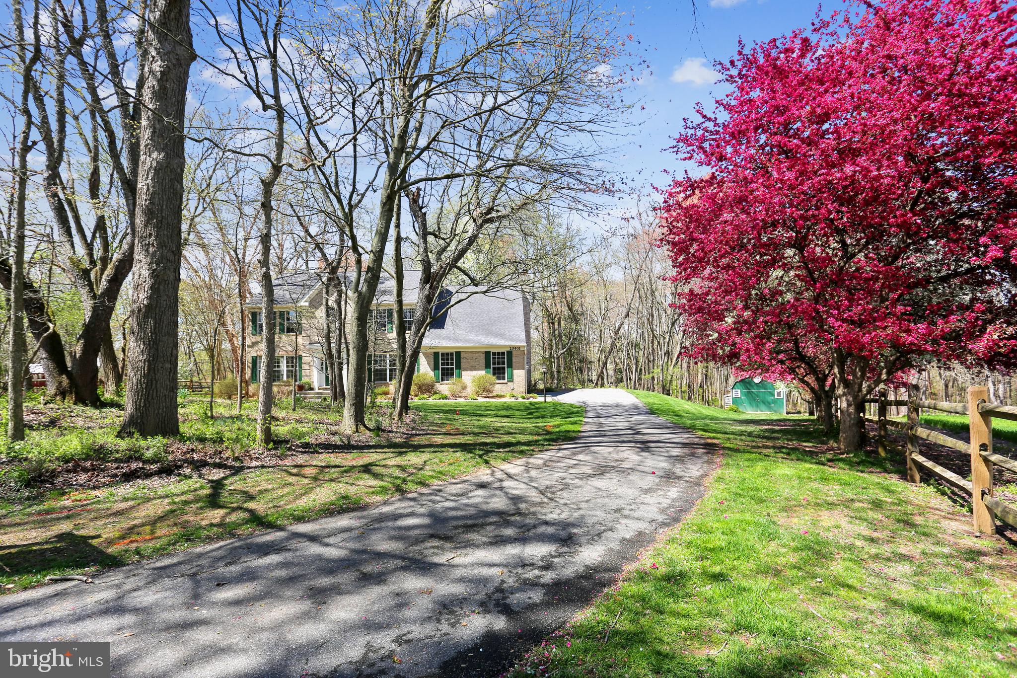 20931 Sunnyacres Road Gaithersburg, MD 20882 - Photo 69 of 83 Driveway leads past beautiful trees to the garage
