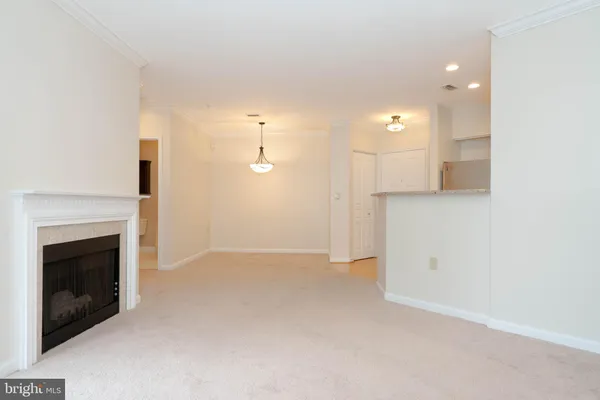 an empty room with closet area