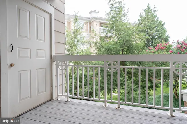 a swimming pool with outdoor seating and yard