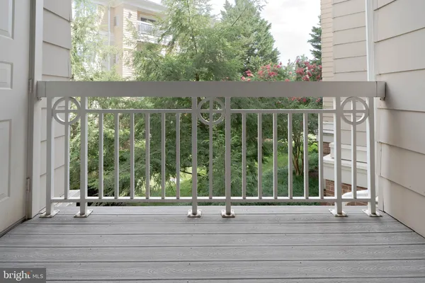 a workspace with wooden floor and a bathroom