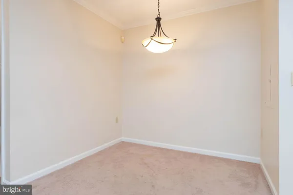 a view of a small space with a fan