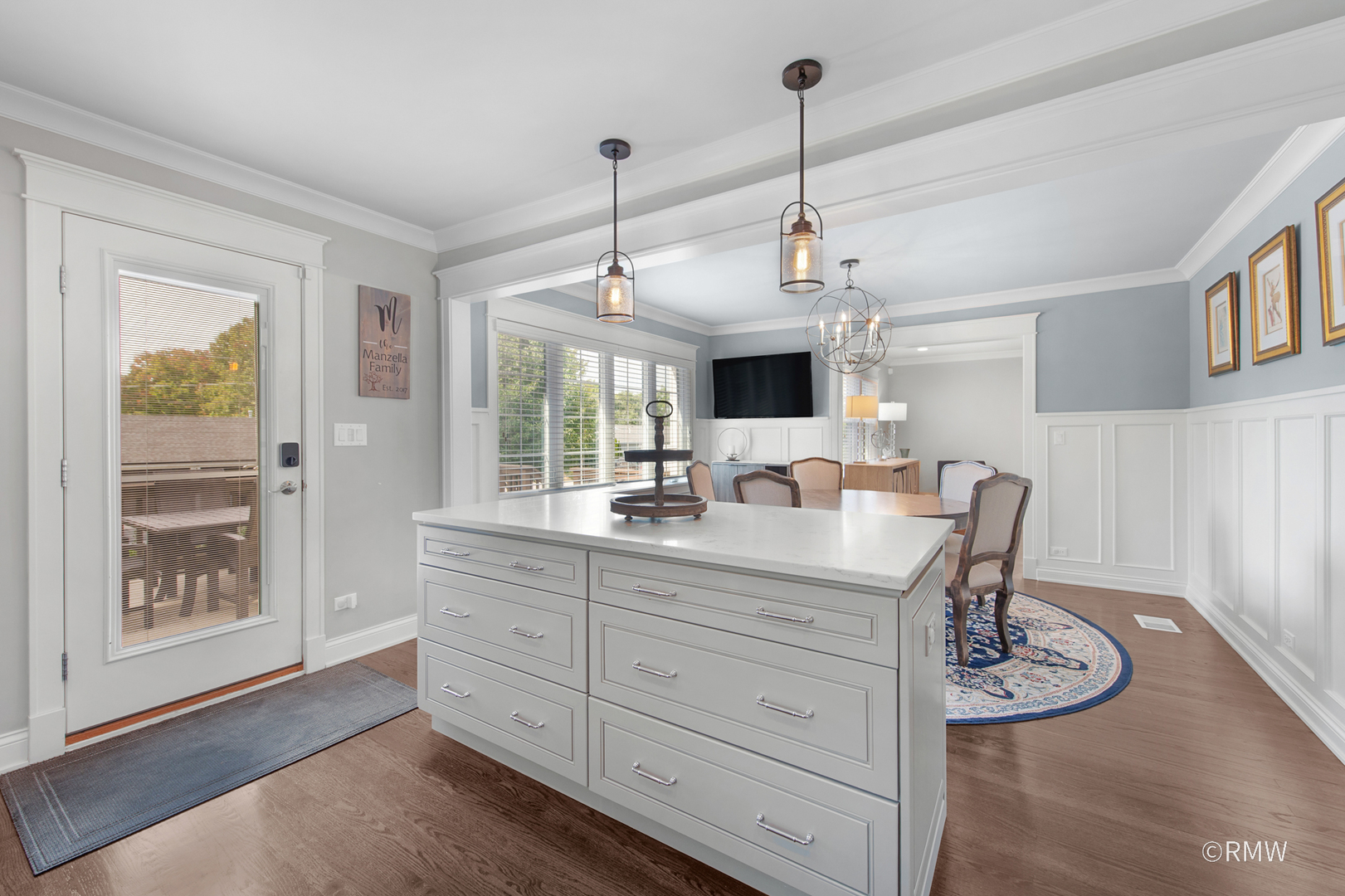 430 North Maple Street Itasca, IL 60143 - Photo 12 of 43 a view of dining room and kitchen with a chandelier