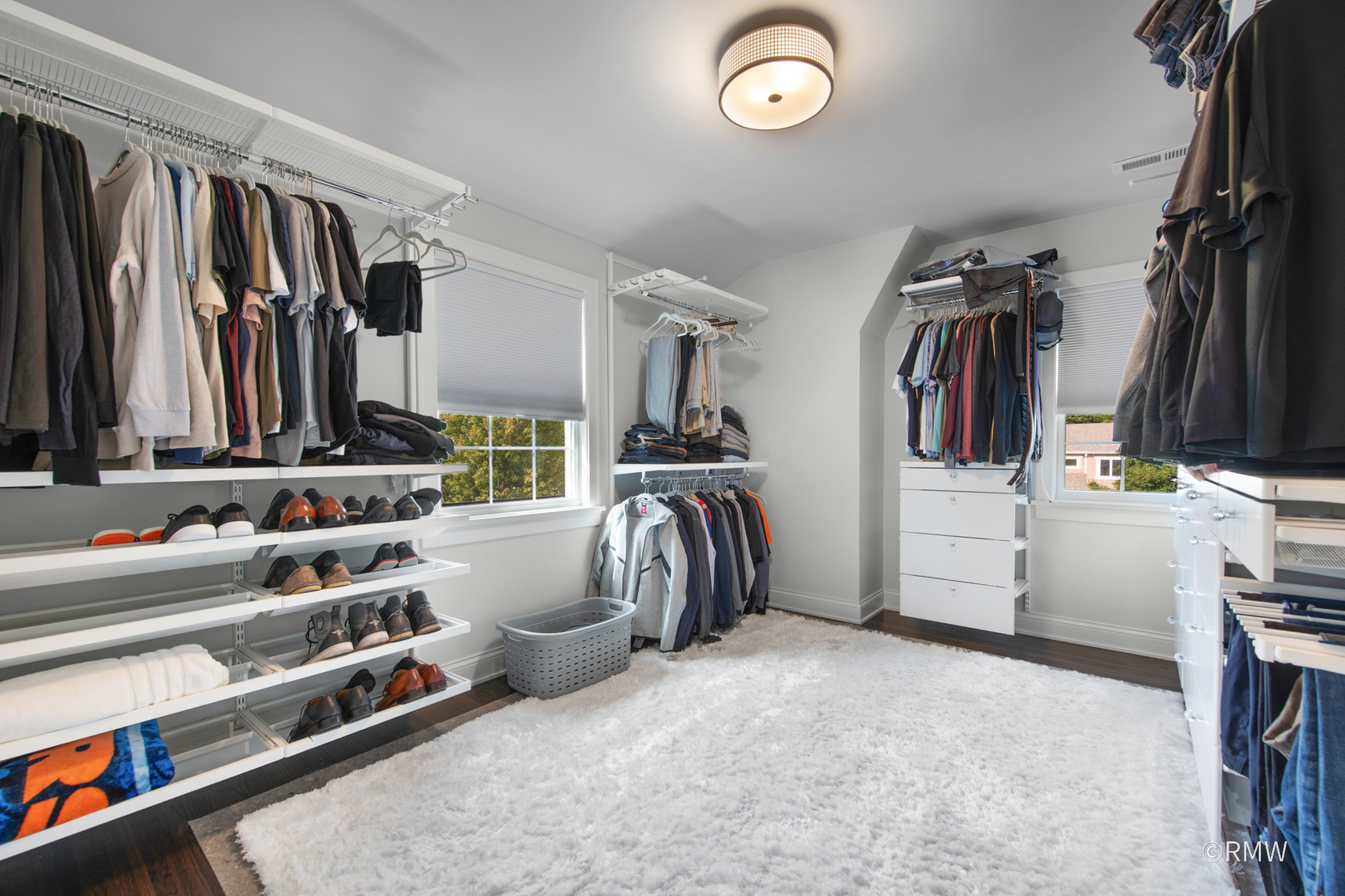 430 North Maple Street Itasca, IL 60143 - Photo 29 of 43 a view of walk in closet with clothes and shoes