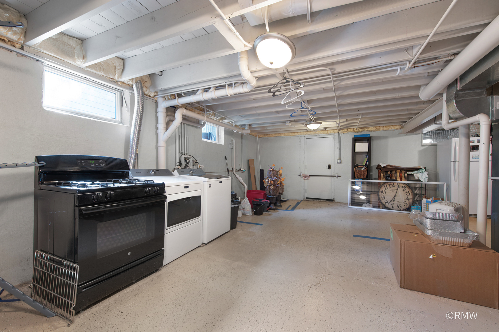 430 North Maple Street Itasca, IL 60143 - Photo 31 of 43 a view of a kitchen with furniture and a ceiling fan