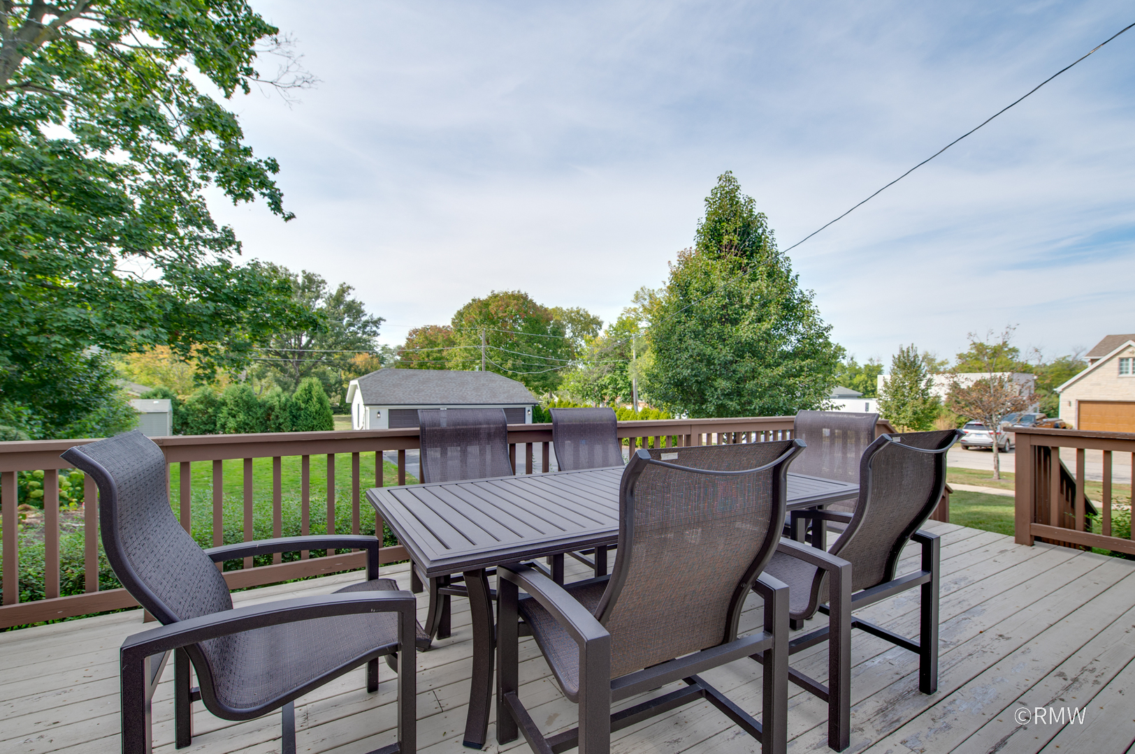 430 North Maple Street Itasca, IL 60143 - Photo 33 of 43 a view of a chairs and table in the roof deck
