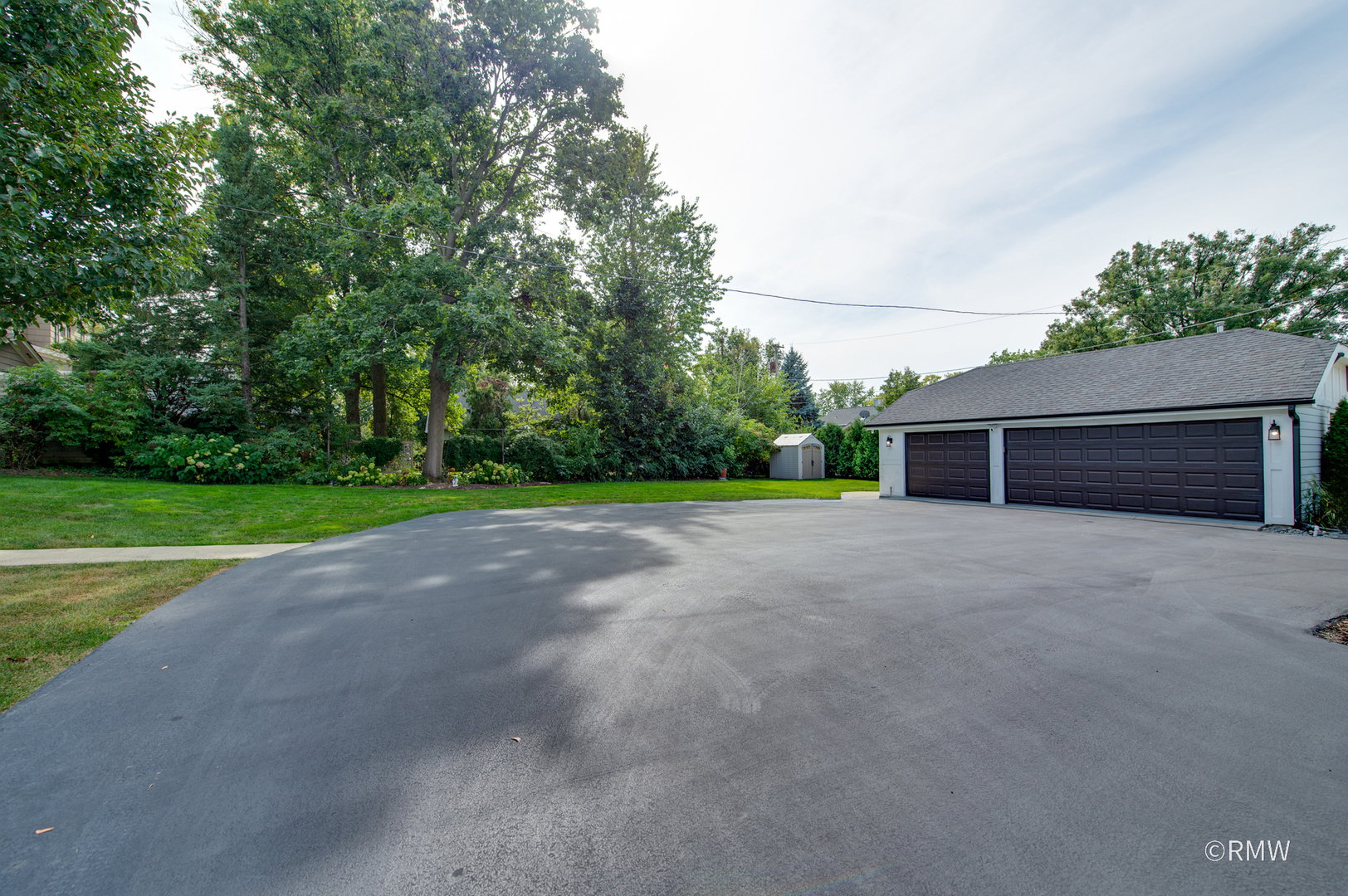 430 North Maple Street Itasca, IL 60143 - Photo 37 of 43 a view of a house with a yard and garage