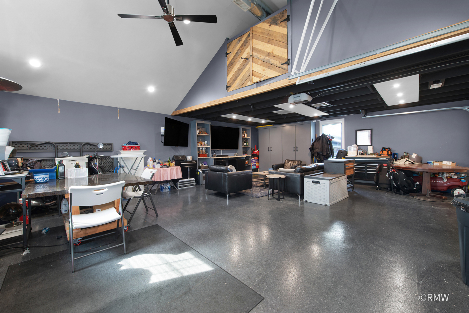 430 North Maple Street Itasca, IL 60143 - Photo 41 of 43 a room with lots of furniture and clutter