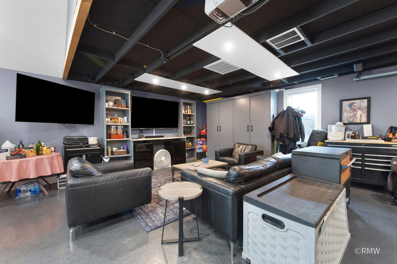 430 North Maple Street Itasca, IL 60143 - Photo 42 of 43 a living room with furniture and a flat screen tv