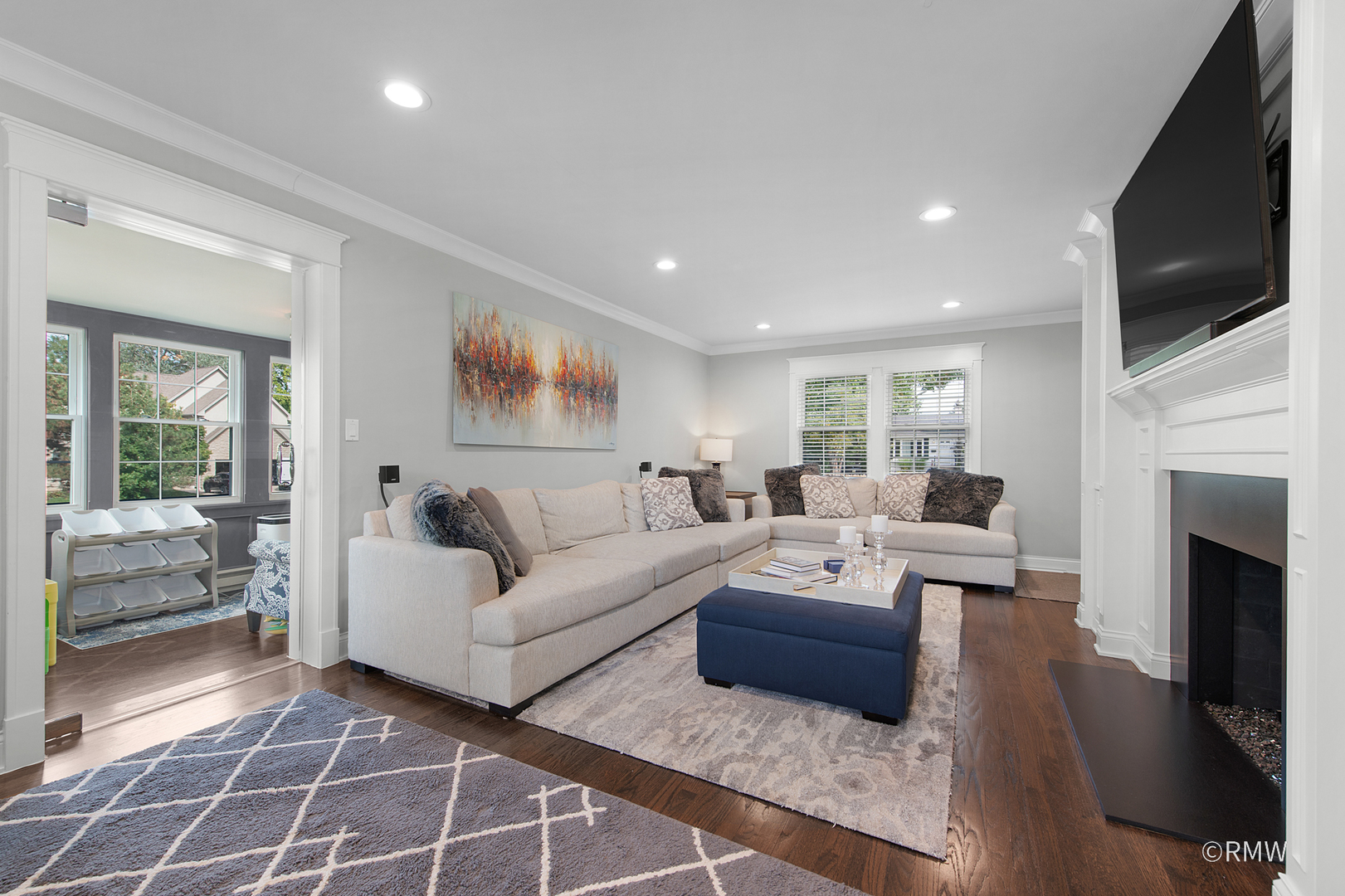 430 North Maple Street Itasca, IL 60143 - Photo 8 of 43 a living room with furniture fireplace and flat screen tv