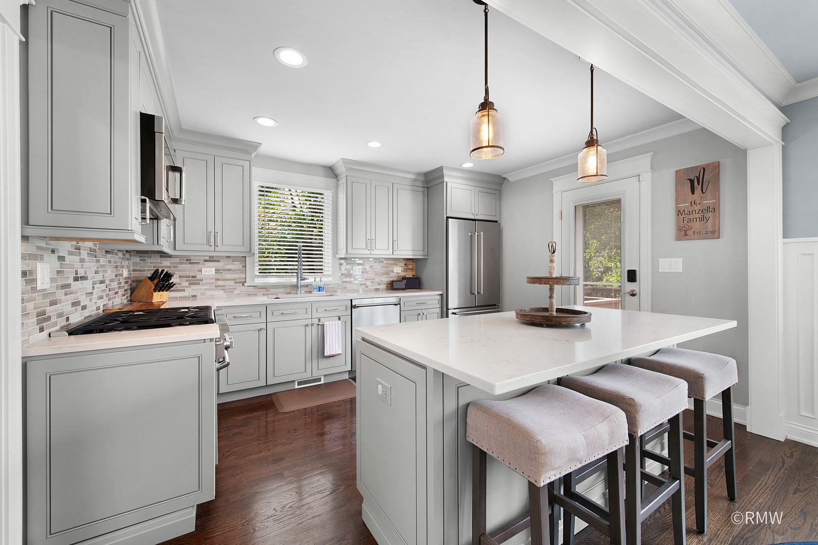 430 North Maple Street Itasca, IL 60143 - Photo 10 of 43 a kitchen with sink a stove and chairs