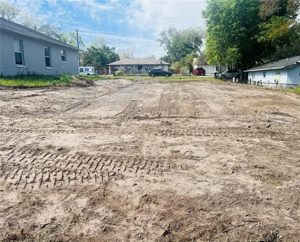 a view of a backyard of a house