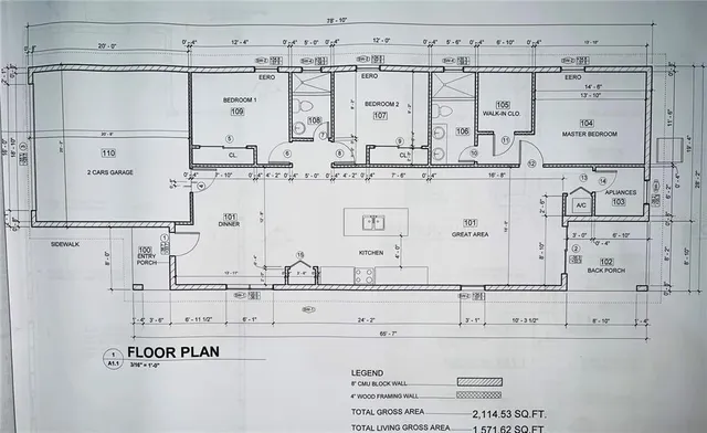 a bathroom with double vanity sink and shower