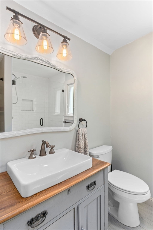1020 Old Falmouth Road Barnstable, MA 02632 - Photo 36 of 42 a bathroom with a sink and a toilet