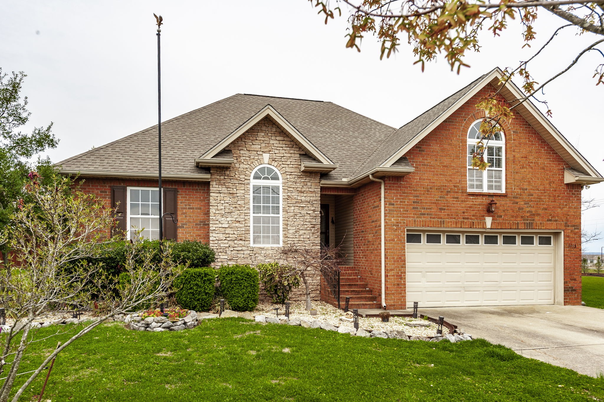 1183 Bothwell Place Gallatin, TN 37066 - Photo 1 of 53 a front view of a house with a yard