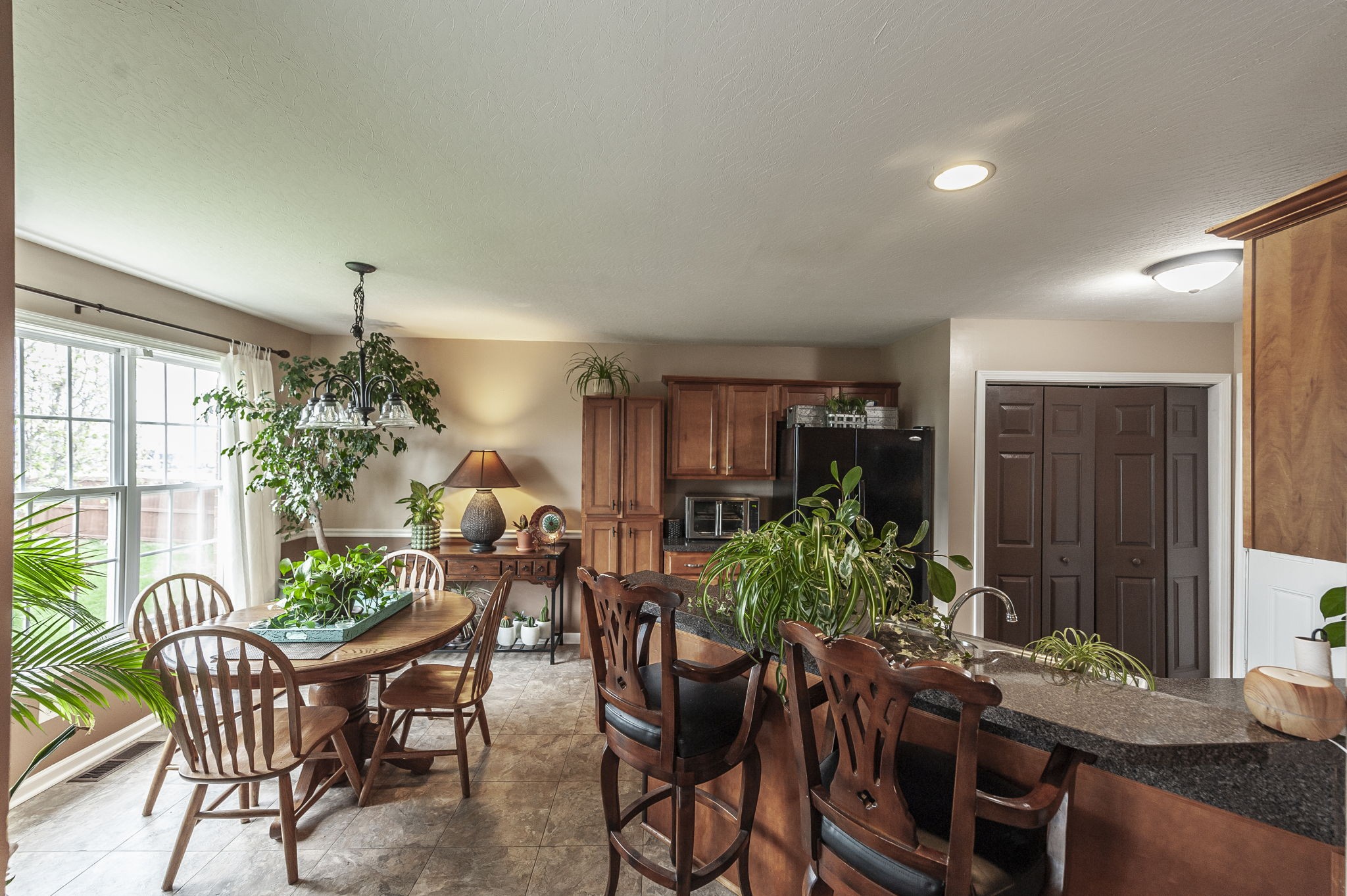 1183 Bothwell Place Gallatin, TN 37066 - Photo 11 of 53 a view of a dining room with furniture window and wooden floor