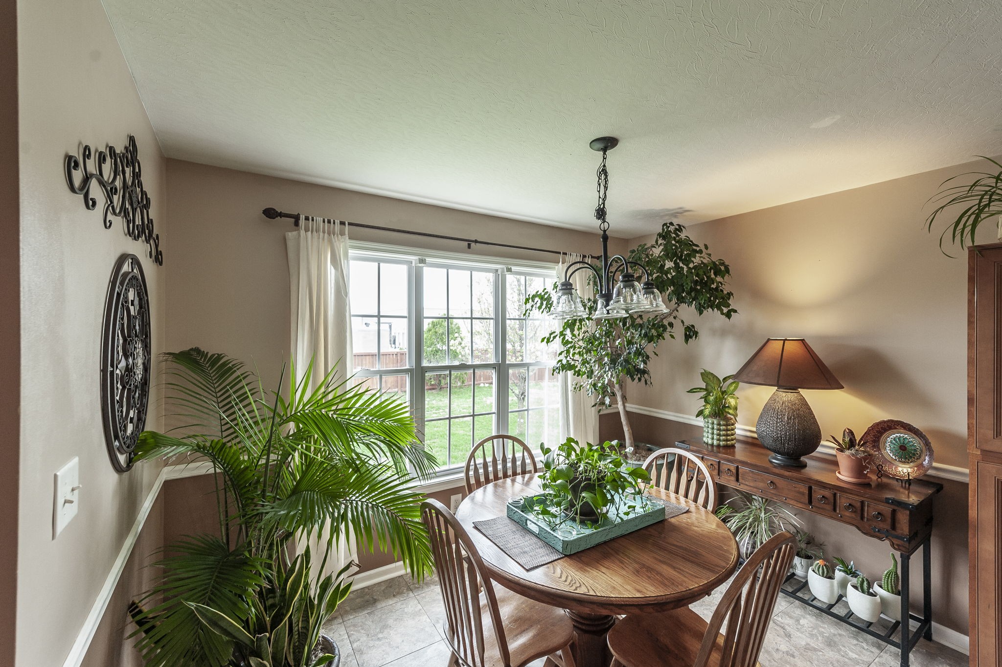 1183 Bothwell Place Gallatin, TN 37066 - Photo 12 of 53 a living room with furniture potted plant and a window