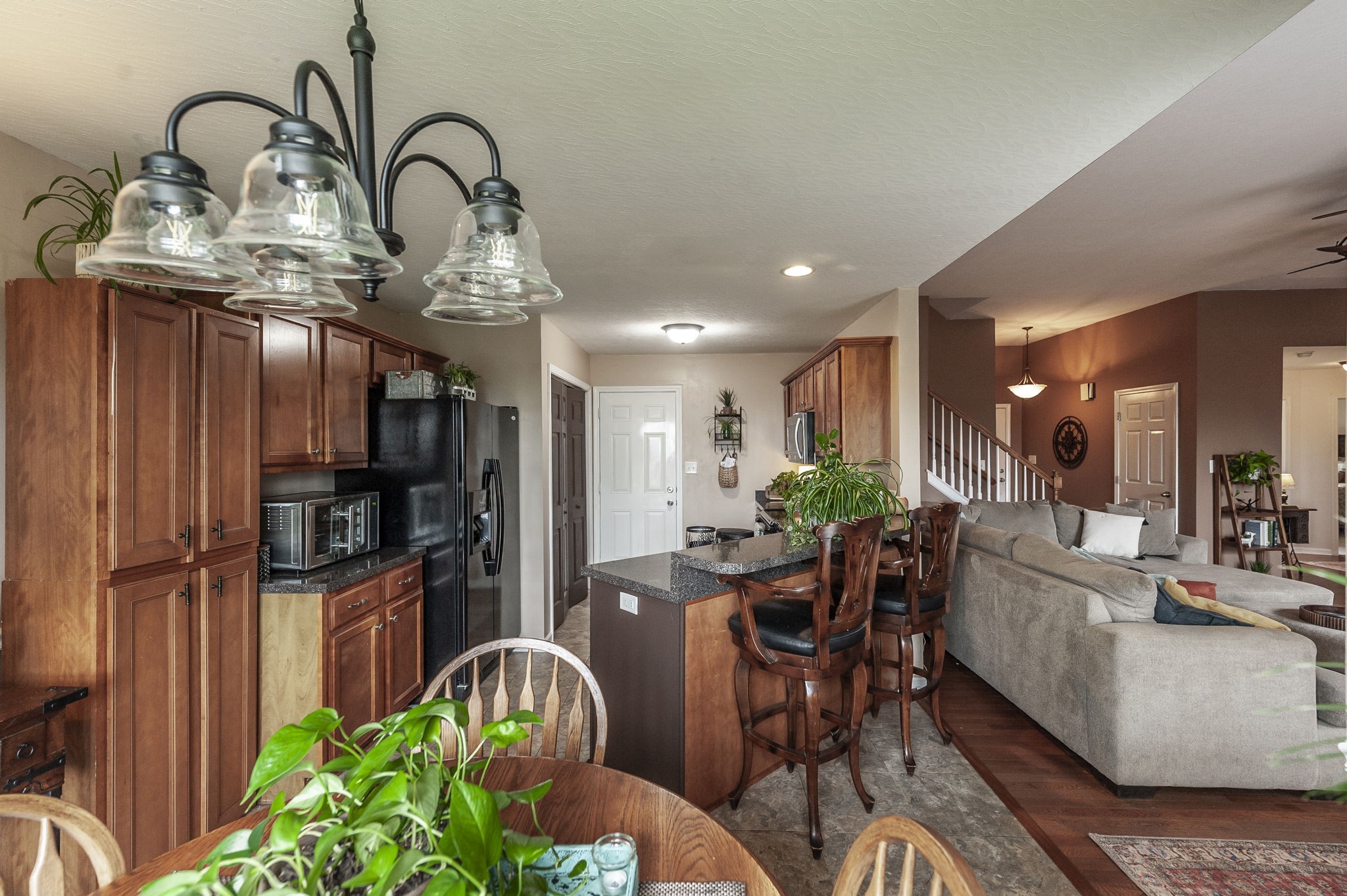 1183 Bothwell Place Gallatin, TN 37066 - Photo 14 of 53 a kitchen with stainless steel appliances a dining table and chairs