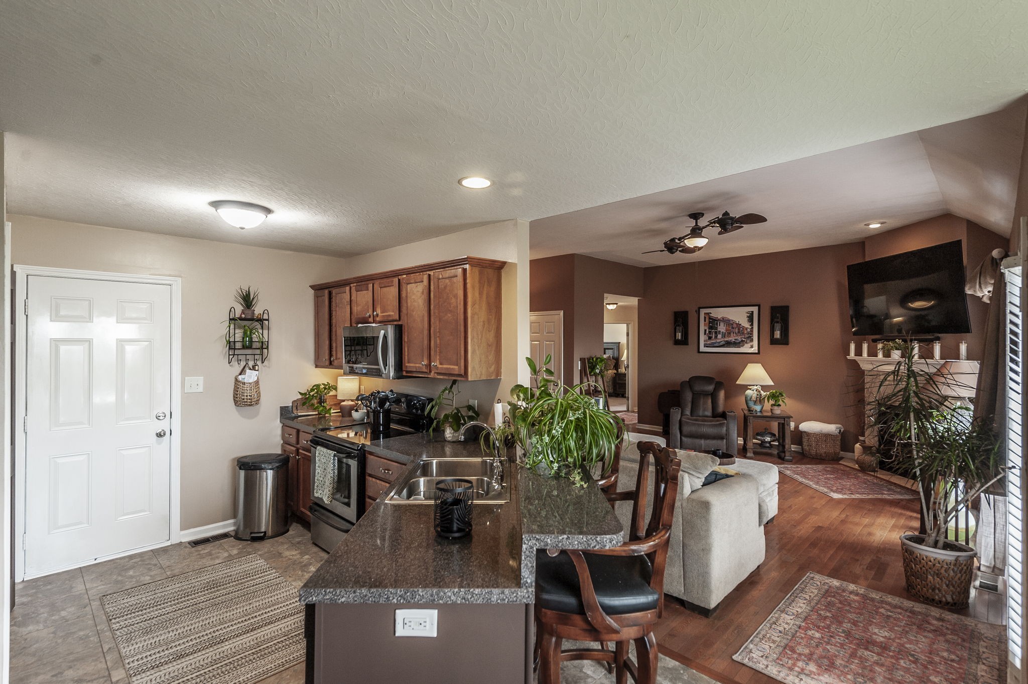 1183 Bothwell Place Gallatin, TN 37066 - Photo 15 of 53 a living room with furniture kitchen view and large windows