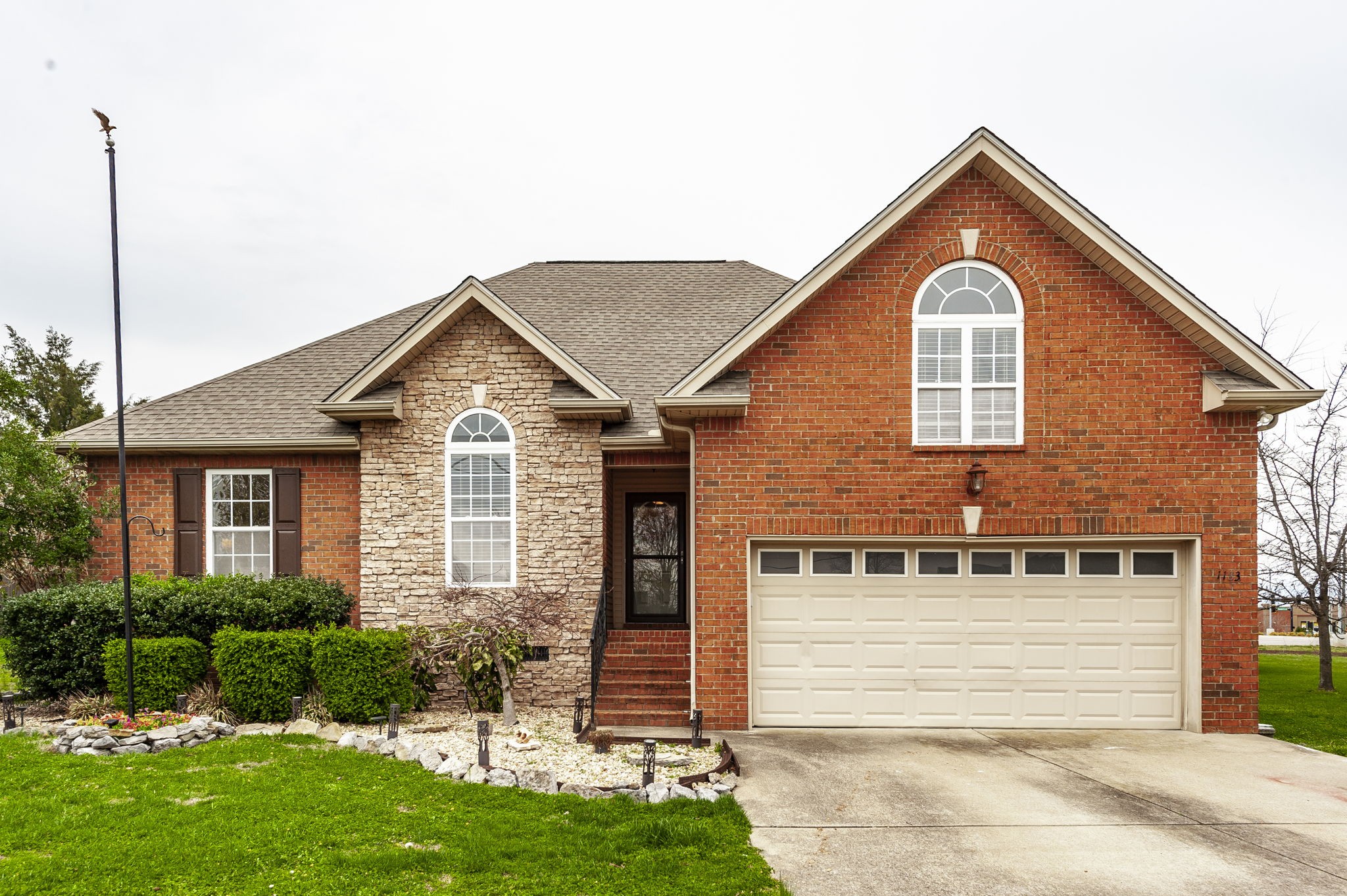 1183 Bothwell Place Gallatin, TN 37066 - Photo 2 of 53 a front view of a house with a yard