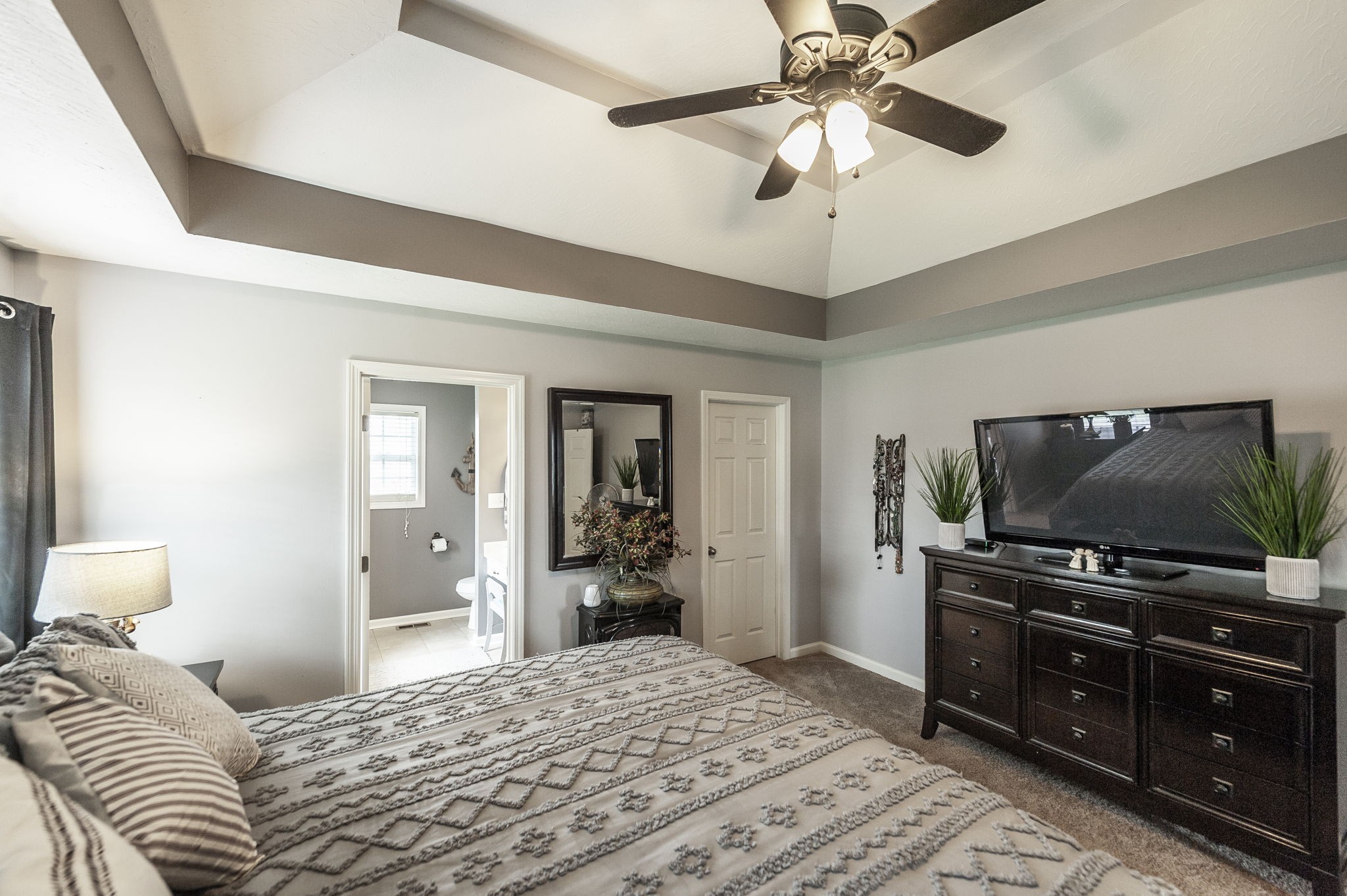 1183 Bothwell Place Gallatin, TN 37066 - Photo 30 of 53 a bedroom with a bed and a flat screen tv