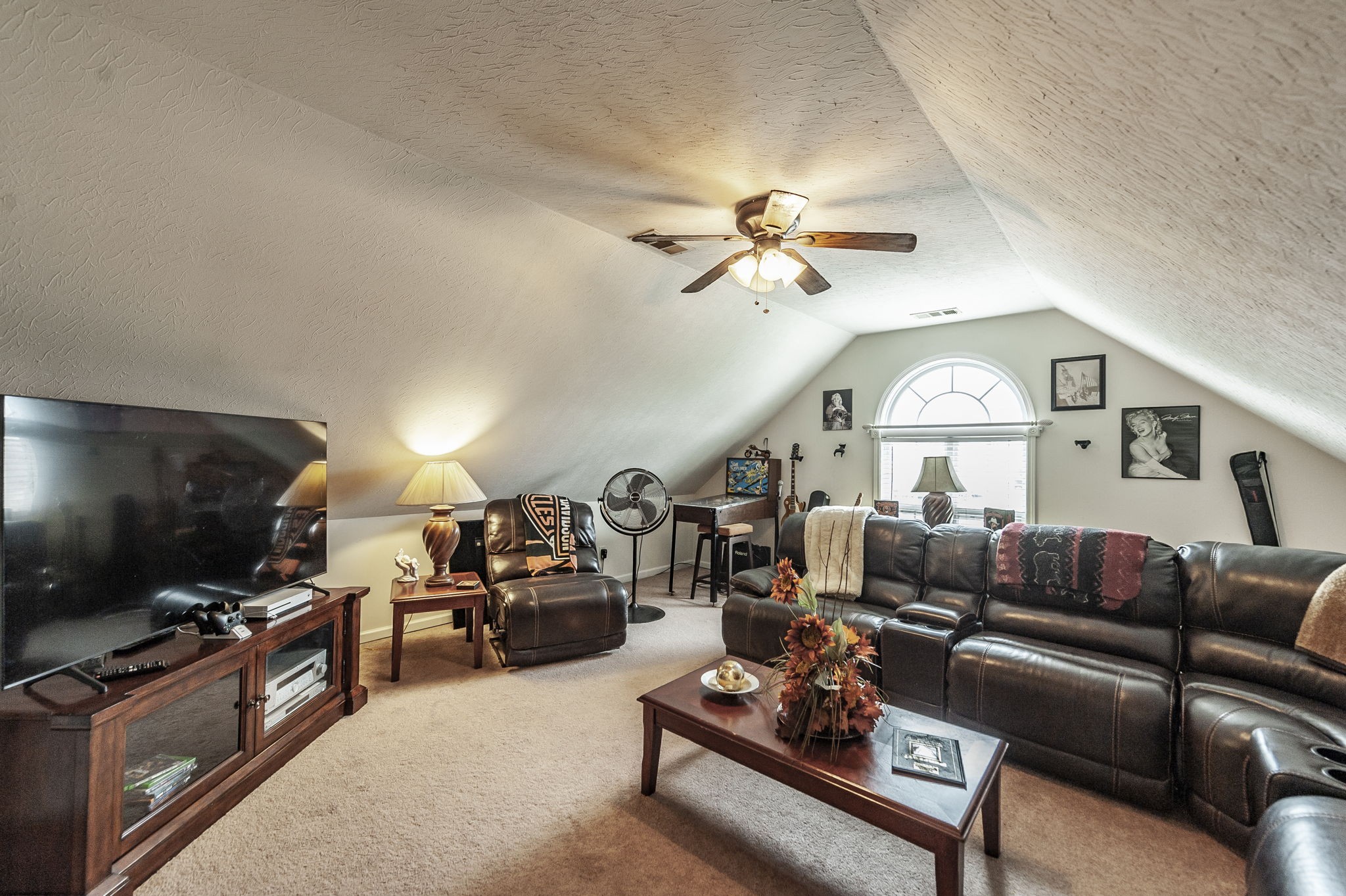 1183 Bothwell Place Gallatin, TN 37066 - Photo 37 of 53 a living room with furniture a large window and a flat screen tv
