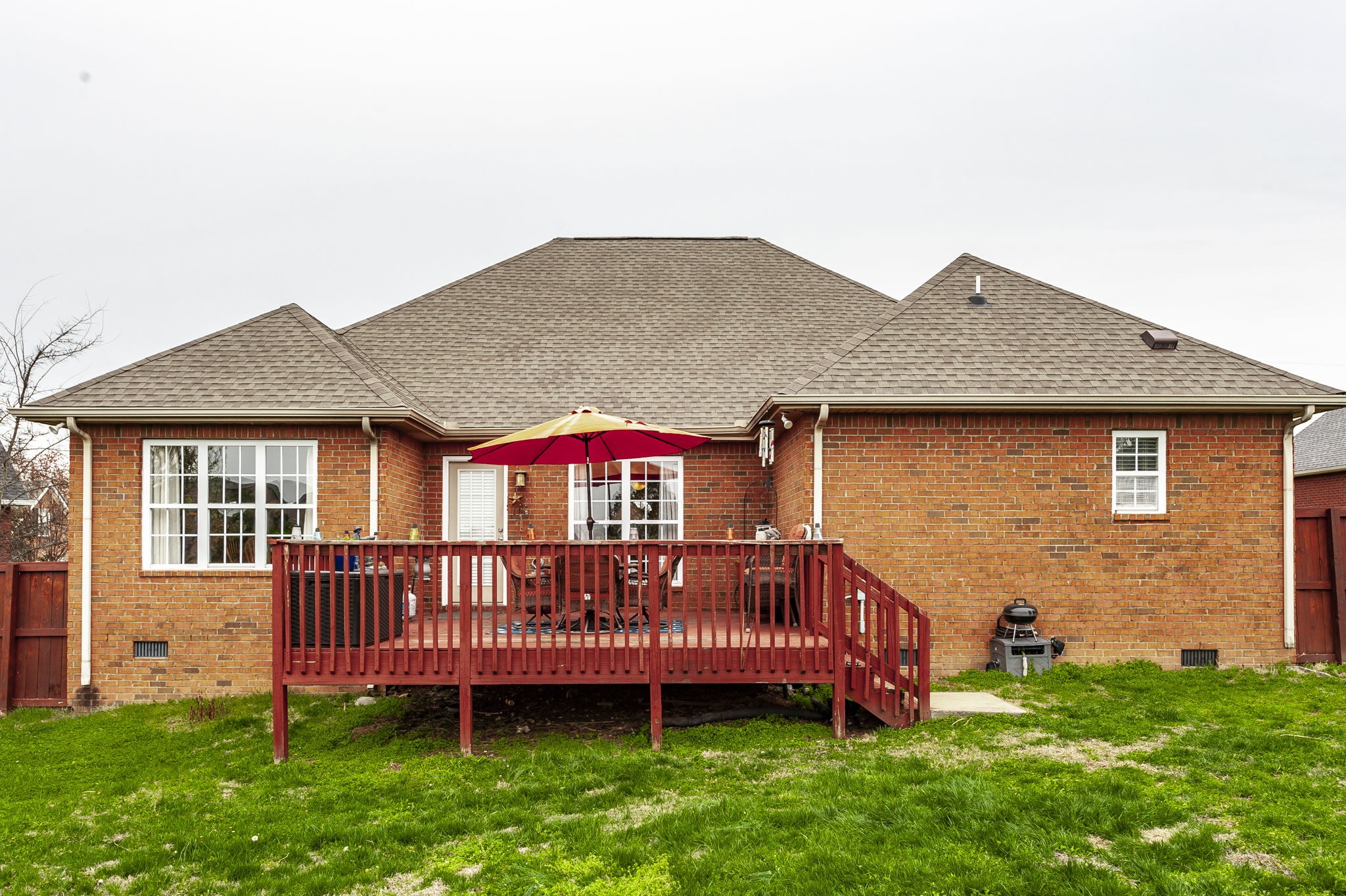 1183 Bothwell Place Gallatin, TN 37066 - Photo 41 of 53 a view of a house with a yard and deck