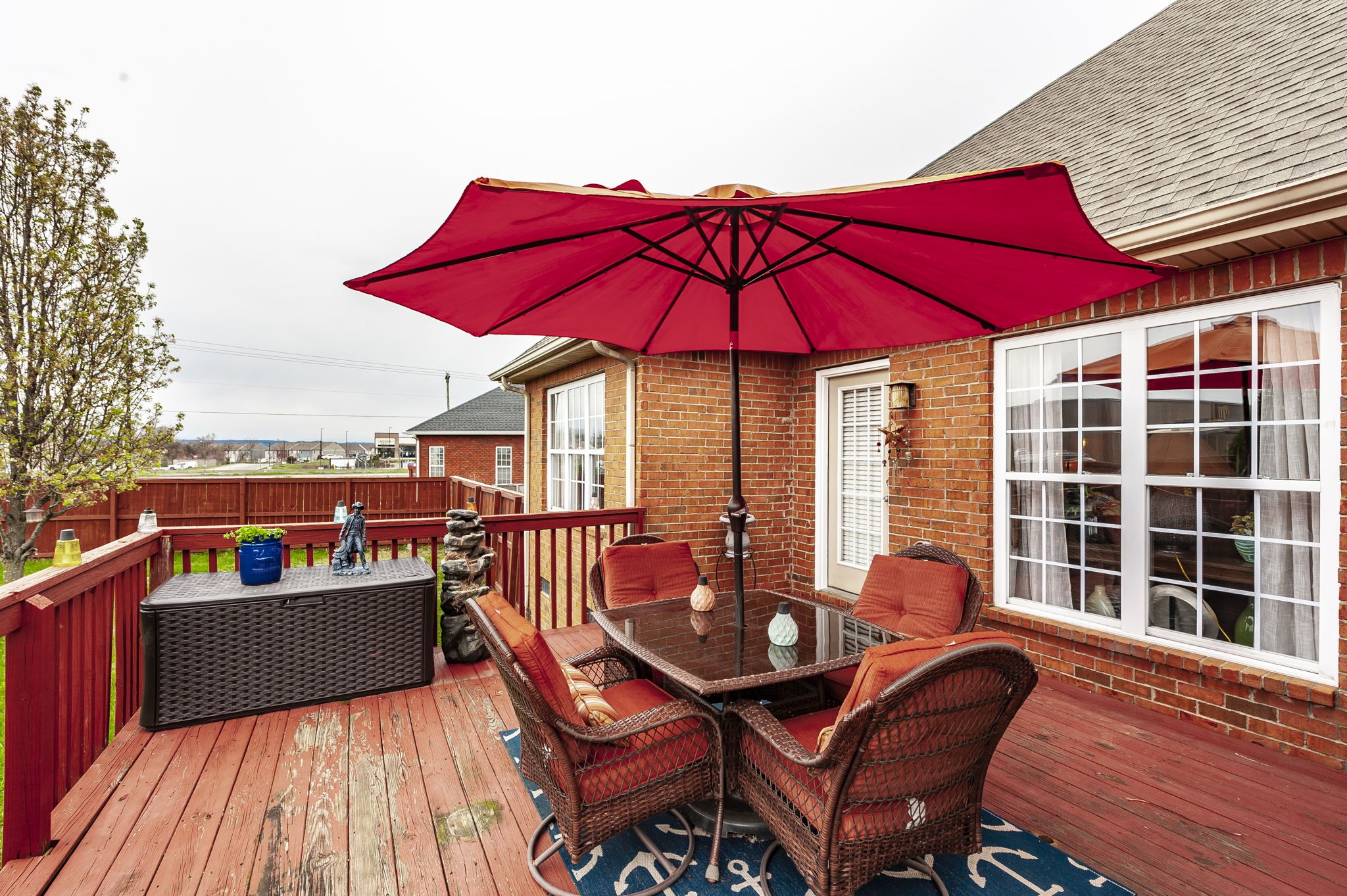 1183 Bothwell Place Gallatin, TN 37066 - Photo 44 of 53 a view of a balcony with wooden floor and outdoor seating