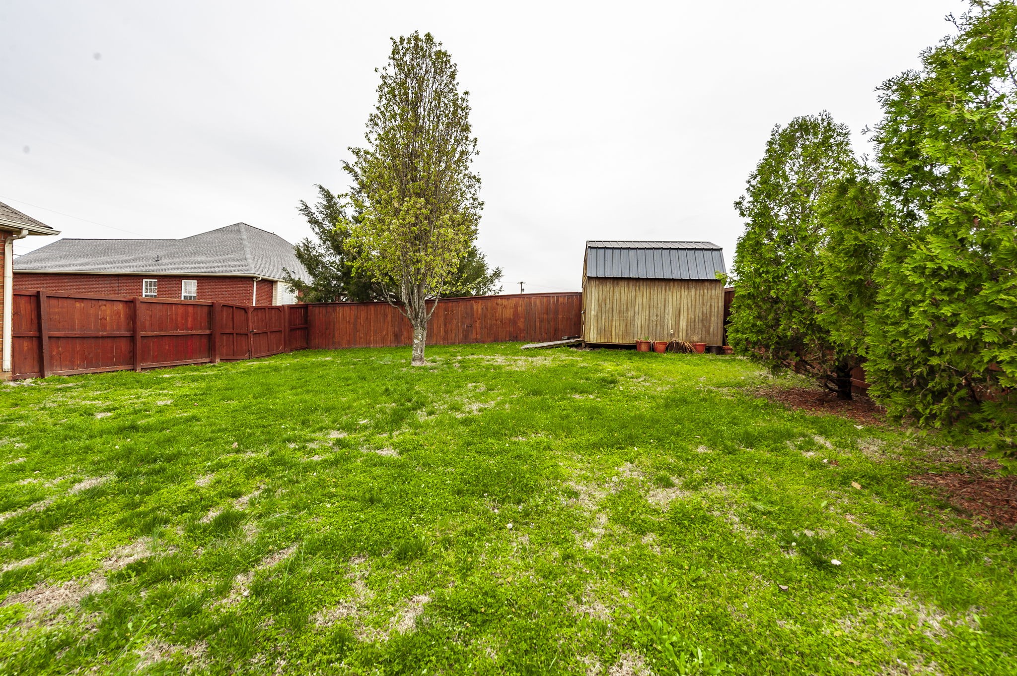 1183 Bothwell Place Gallatin, TN 37066 - Photo 47 of 53 a view of a house with a yard and sitting area