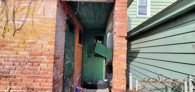 a view of a door and a window
